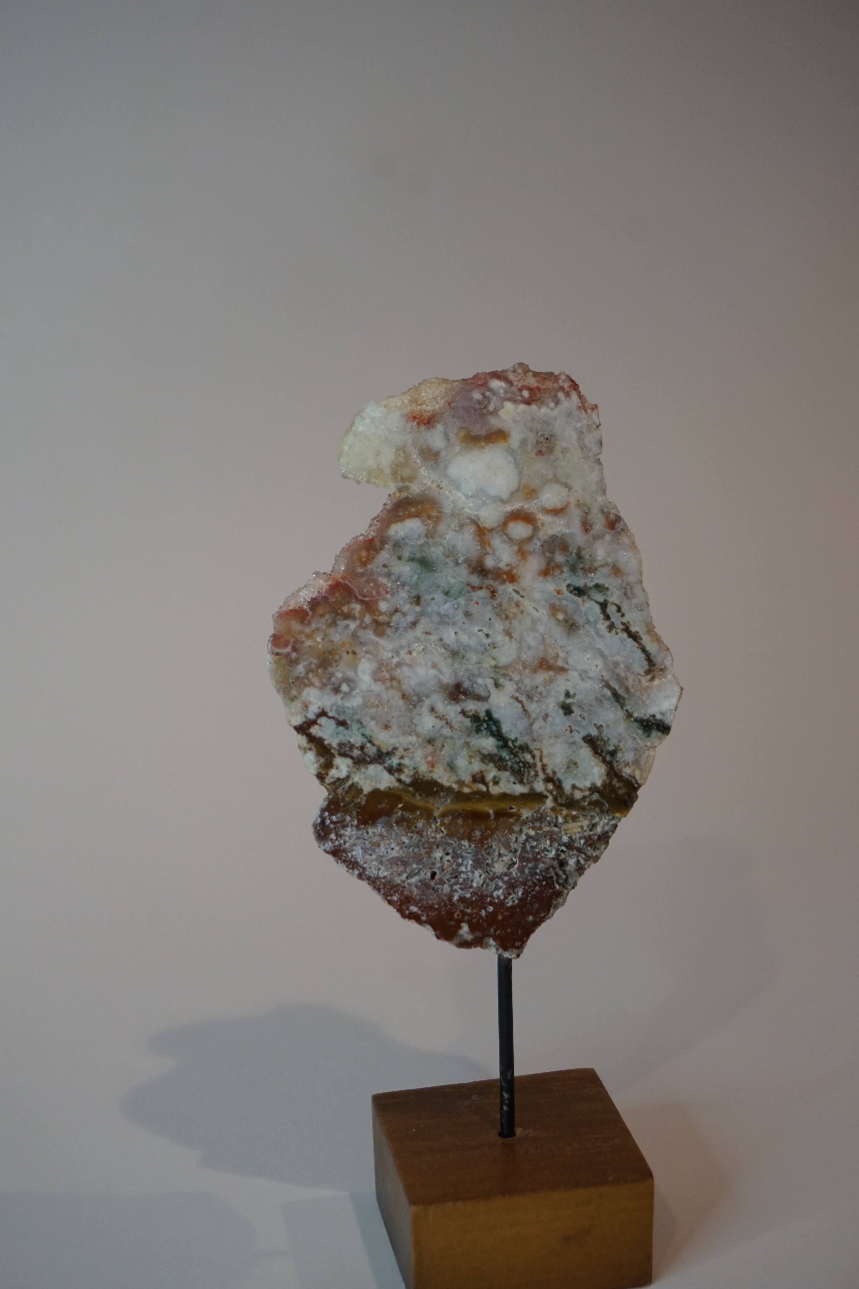 pink amethyst crystal on stand - a