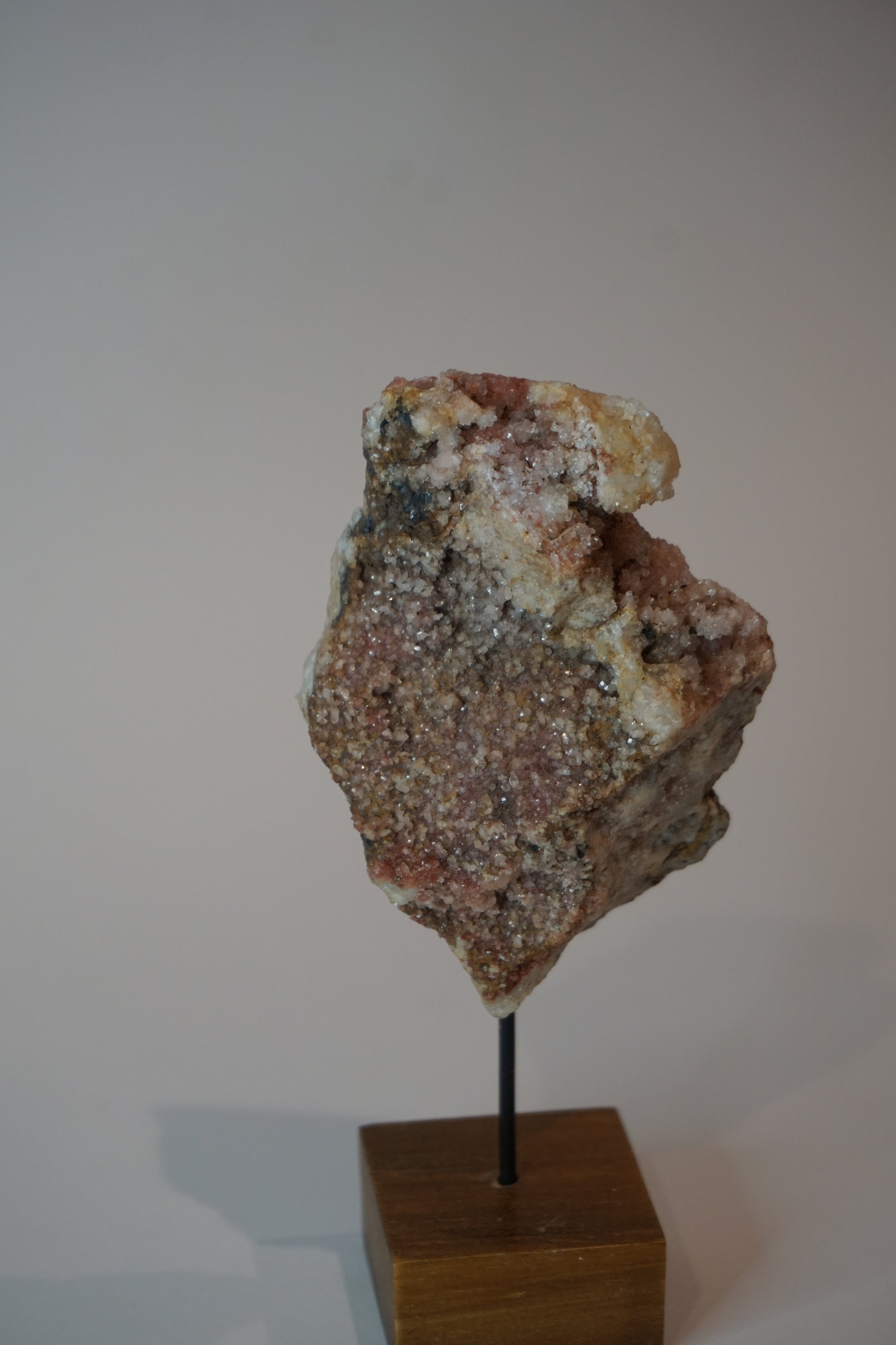 pink amethyst crystal on stand - a