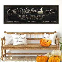 The Witches Inn Sign