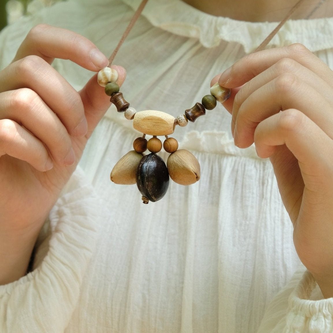 "Woodland Echo" Seed＆Wood Bead Necklace