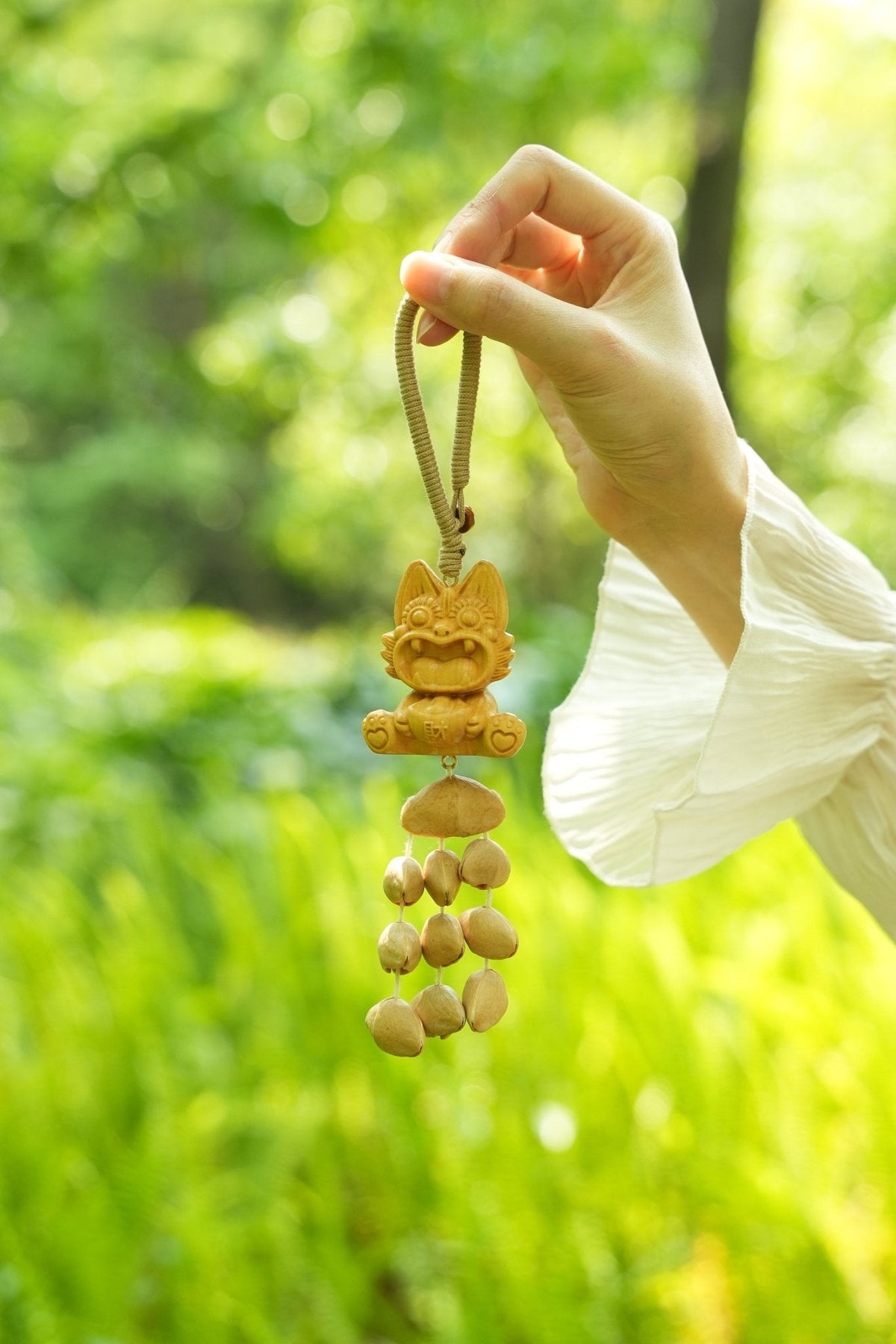 "Fortune Tiger" Wood Carved Seed Charm