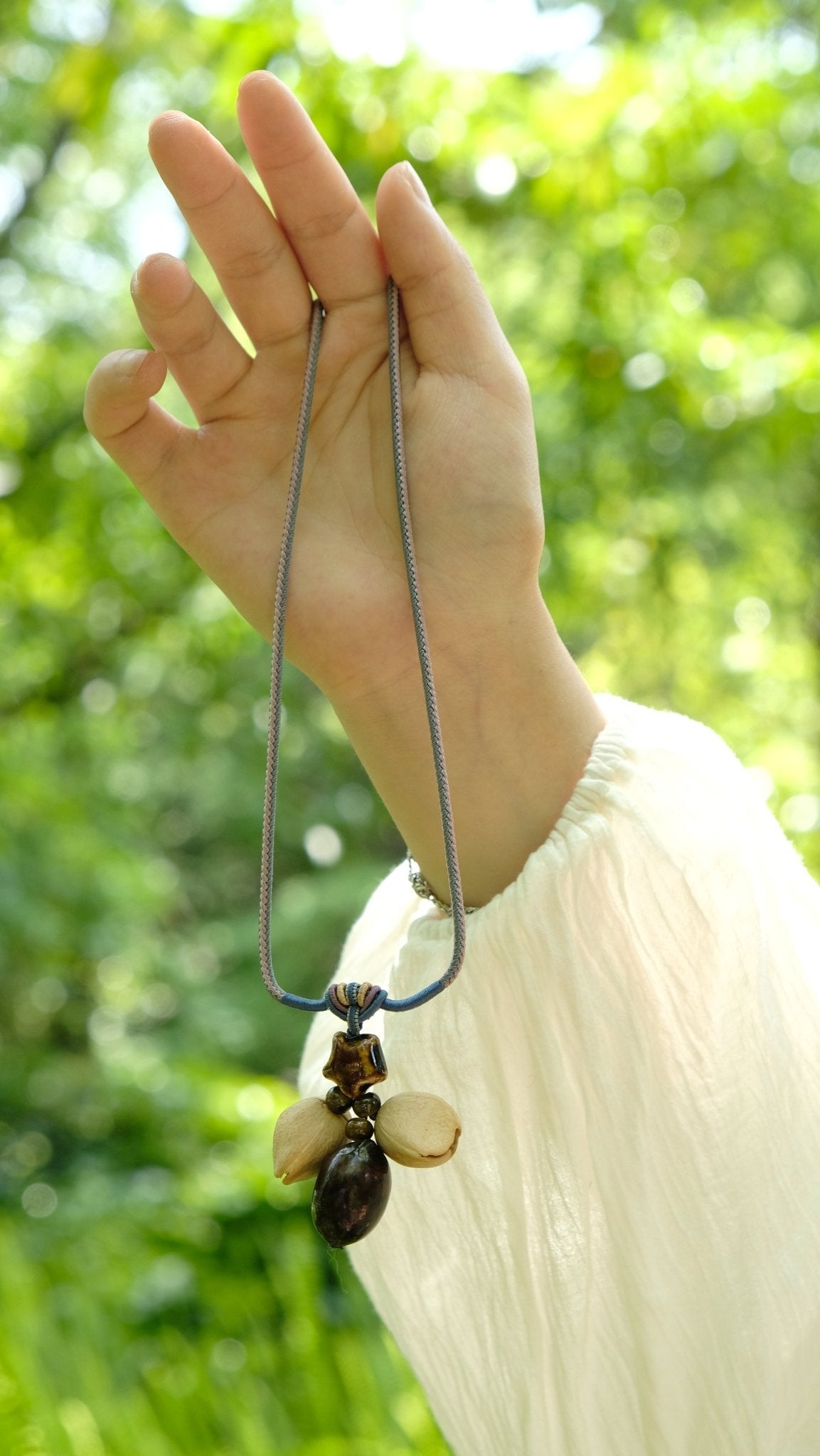 "Guiding Star" Natural Seed Glazed Necklace