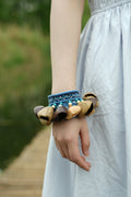 "The Indigo Beat" Embroidered Wrist Rattle