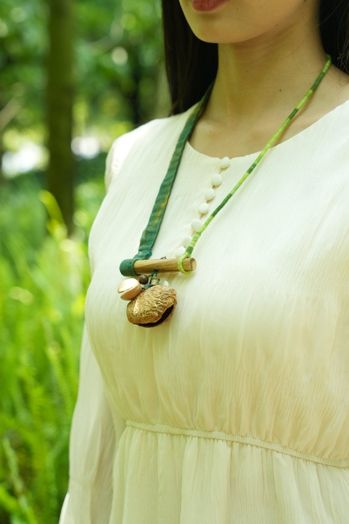 "The Mossy Branch" - Green Fabric Strap Necklace with Wood Bar & Seed Pod