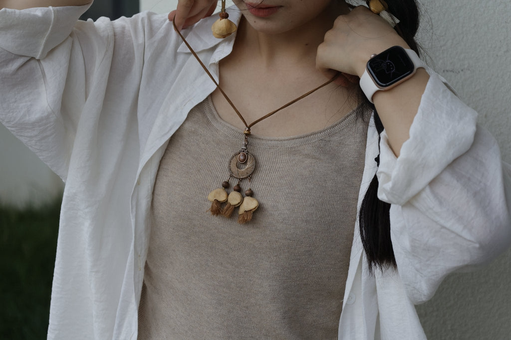 "Sunset Weaver" Bronze Mandala Seed Necklace