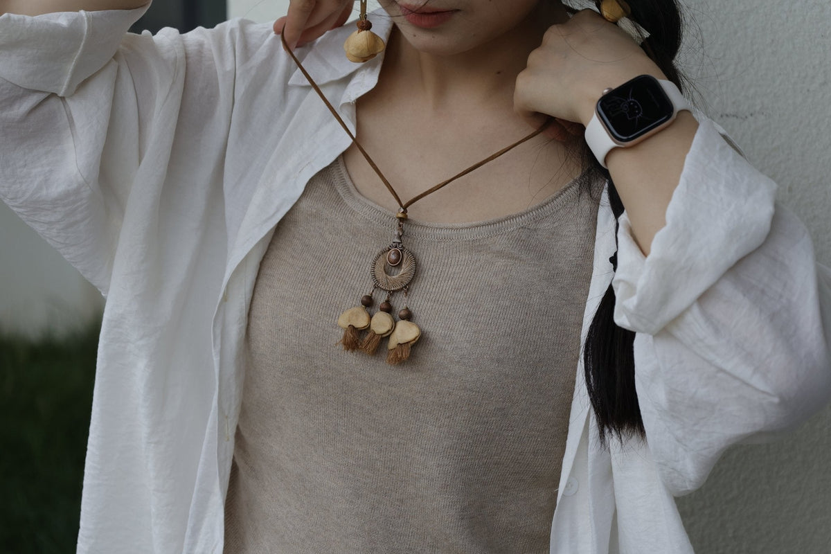 "Sunset Weaver" Bronze Mandala Seed Necklace